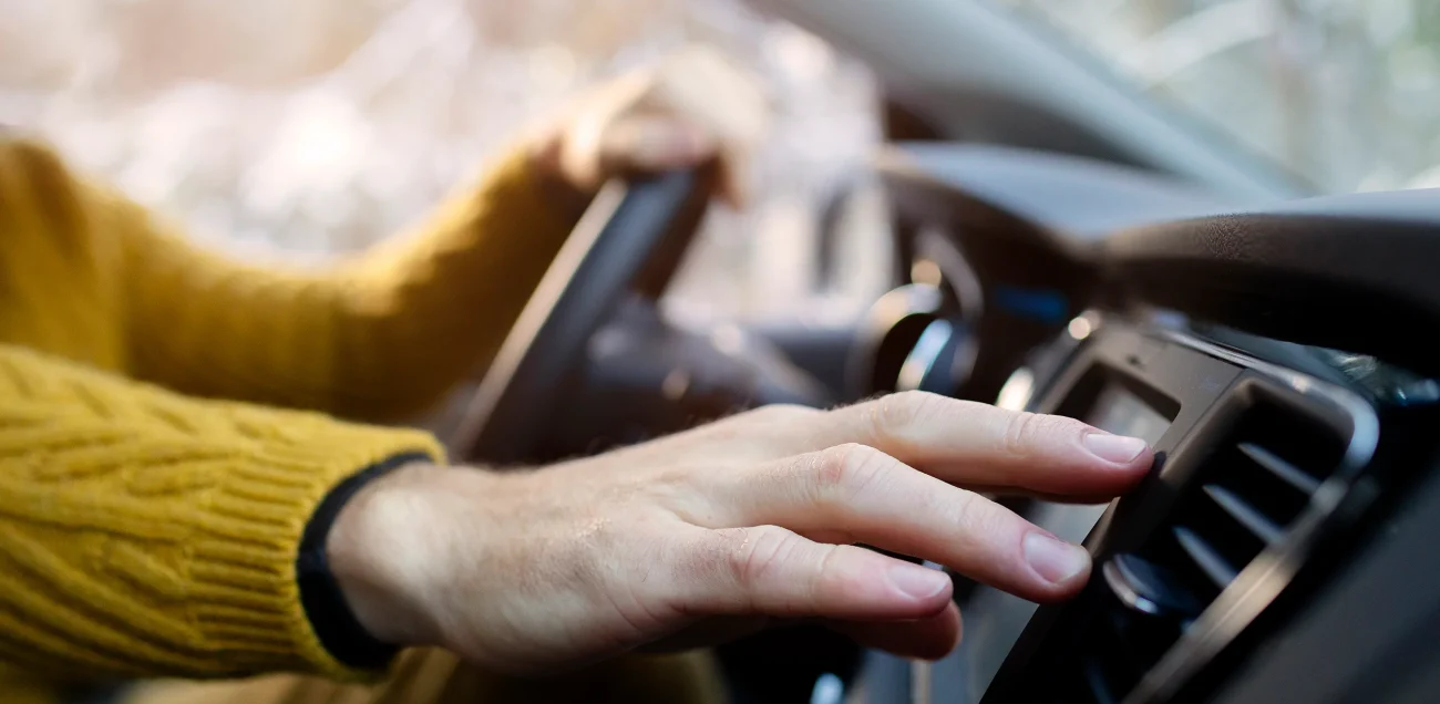 close-up-hand-holding-steering-wheel (1)